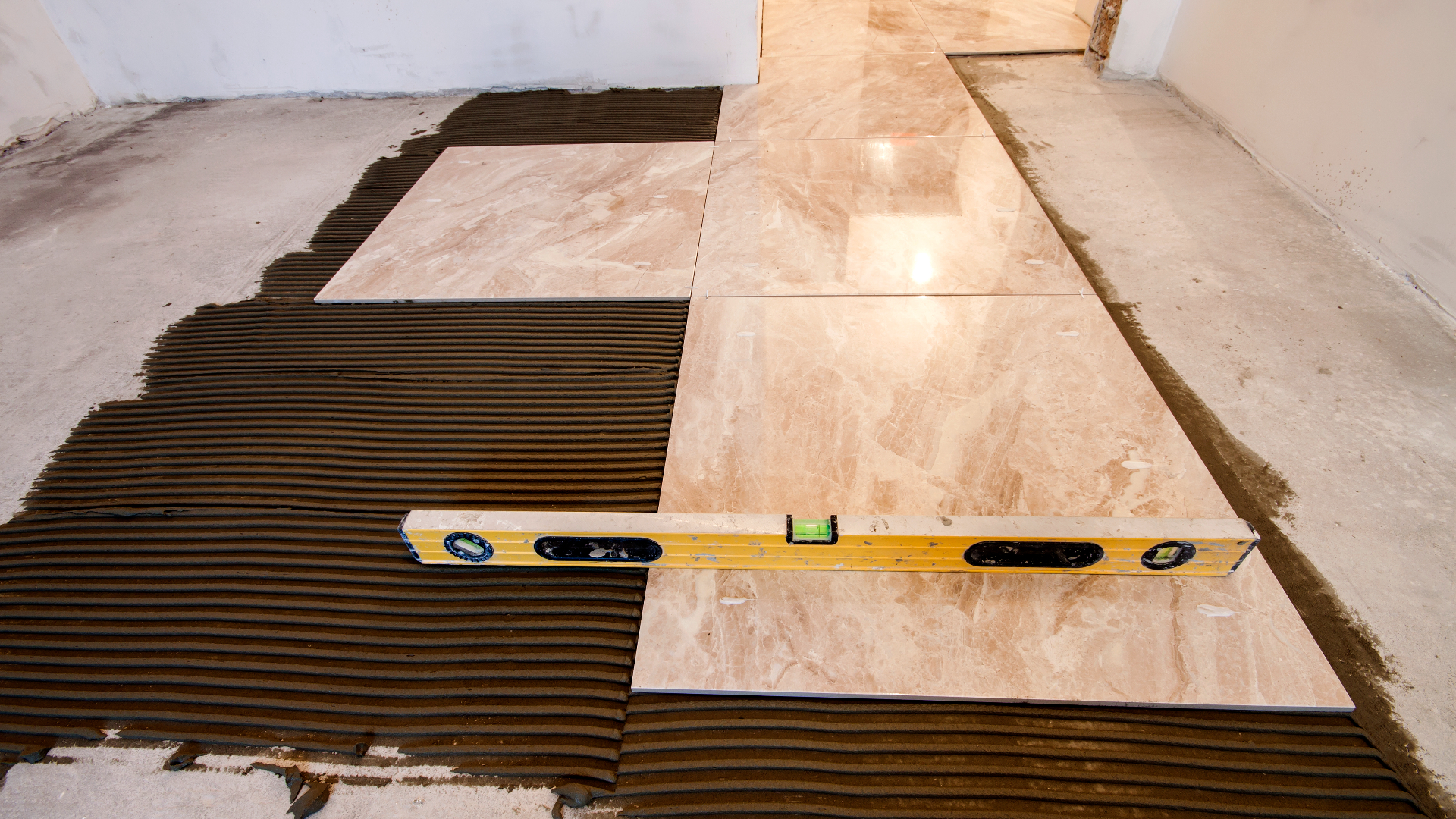 Plattsättning i Uppsala av keramikgolv.